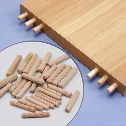 Pro Grade 900 Pieces Wooden Dowel Pins Kit For Woodworking Doweling Jig Set Round Fluted Wooden Plugs Pins And Rods Locator Furniture Fittings In 6mm And 10mm Sizes Handy For Crafts And DIY Projects. Wooden dowel pins inserted into a board joint, with mixed sizes shown