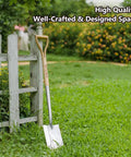 Heavy Duty 41 Inch Stainless Steel Border Spade With D Grip Handle for Garden Digging and Transplanting resting by a fence