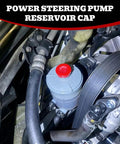 Heavy Duty Red Hydraulic Power Steering Reservoir Cap Slick Aftermarket Fluid Lid Cover Dead Nuts Reliable Screw Top Plug For Cars And Trucks Smooth Ride Replacement 53697SB3952 installed on a vehicle.
