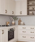 10 Pack Vintage Cabinet Pulls in Antique Brass Finish With 2.5 Inch Center Hole on kitchen drawers and cabinets