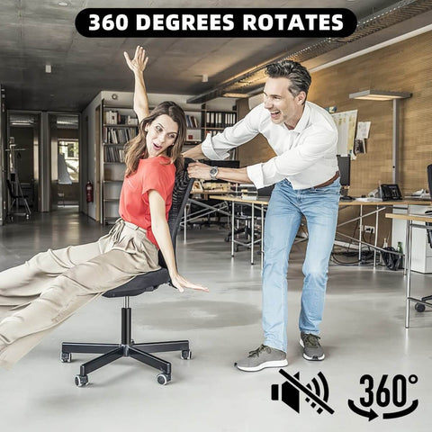 Two people enjoying the 360-degree rotation feature of an office chair in a modern workspace.
