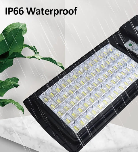 JUDYSSY 150W Solar Street Light showing IP66 waterproof feature with LED beads and rain in the background.