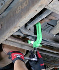 Beefy Heavy Duty Torsion Bar Removal Tool With Extended C Frame And Ford Dodge Adapter in use under vehicle suspension