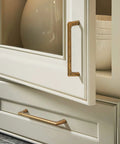 Close-up of cabinet with 10 Pack Vintage Antique Brass Cabinet Knobs 1.25 Inch Diameter Zinc Alloy Single Hole Center Mount Pull Hardware