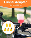 Road Ready All In One Brake Bleed Kit For Hydraulic Disc Brakes with clear funnel and adapters attached to bike handlebar.