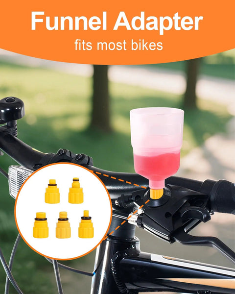 Road Ready All In One Brake Bleed Kit For Hydraulic Disc Brakes with clear funnel and adapters attached to bike handlebar.