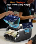 Mixed Denomination Money Counter With Multi Currency Support, Dual Display, UV IR MG Counterfeit Detection in use at counter