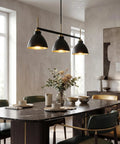 Black And Gold 3 Light Linear Kitchen Island Pendant With Adjustable Rods over dining table in modern dining room