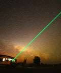 Night sky with green laser beam from Rechargeable Green Laser Pointer High Power Beast Long Range Beam for astronomy use.