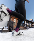 Heavy Duty Tungsten Carbide Spikes For Ice Walkers Large X Large Black Traction Cleats on snowy sidewalk with runner.