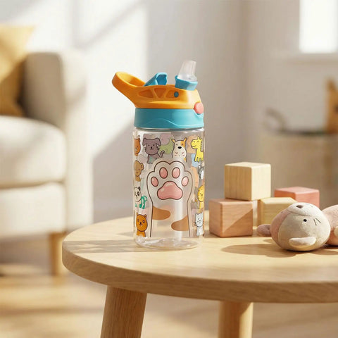 Children's water bottle with animal prints on wooden table, surrounded by toys, 140 ml capacity.