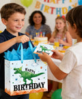 Child with 13 Inch Large Watercolor Dinosaur Birthday Gift Bag With Handles, Greeting Card And Tissue Paper, at party.