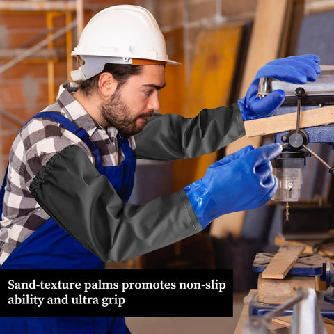 Worker wearing heavy duty 25 inch PVC chemical resistant waterproof gloves for chemical and acid work long rubber safety gloves