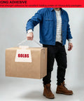 Person lifting a 60 lbs box, demonstrating strong adhesive capacity of Heavy Duty Packing Tape For Moving And Packaging, Clear 65