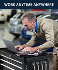 Man using laptop on 7-Drawer Rolling Tool Chest With Locking System, Beefy Heavy Duty Alloy Steel Cabinet On Wheels For Garage