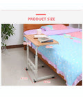 Adjustable Height Rolling Overbed Table With Easy Glide Casters For Bed Sofa Or Recliner Solid Sturdy Laptop Desk Total Win For Small Spaces And Chill Gaming Nights, shown next to bed measuring 60cm by 40cm.
