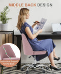 Woman using Comfy Vanity and Desk Chair with Wide Seating Armless Height Adjustable Rolling Swivel Task Chair Blush at desk