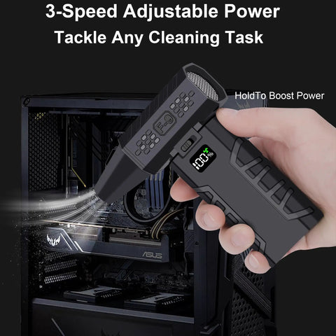 Cordless Compressed Air Duster With Up To 130000 RPM Dust Busting Portable Mini Blower in hand, cleaning computer case