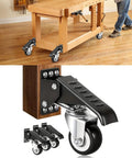 Retractable Workbench Casters With Quick Release Plate Four Pack Polyurethane Stepdown Wheels mounted on a wooden workbench.