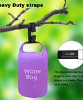 Heavy duty strap holding a purple water bag from a tree branch, showcasing strength with Adjustable 1 Inch Hook And Loop Cable Straps With 50 Metal Buckles