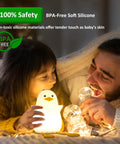Child and adult enjoying Seagull Silicone Night Light for Kids Portable Rechargeable Bedside Lamp for Nursery with Touch Control
