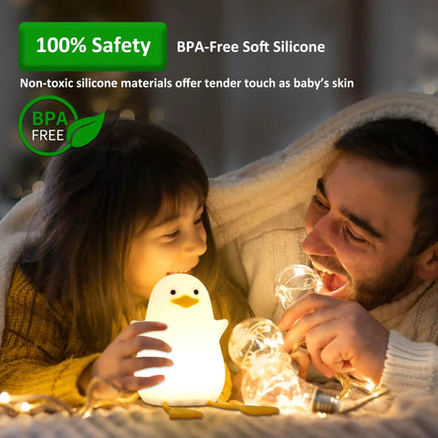 Child and adult enjoying Seagull Silicone Night Light for Kids Portable Rechargeable Bedside Lamp for Nursery with Touch Control