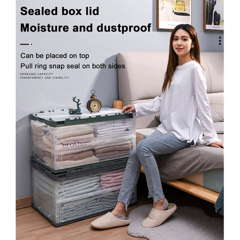 Heavy Duty Collapsible Storage Bins With Lids Super Sturdy Plastic Folding Crate organized with clothing, placed next to a sofa.