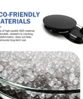 Quartet Of Sleek Black Wheel Center Caps Crafted From Hella Durable Abs, showing matte black cap and ABS beads for durability.