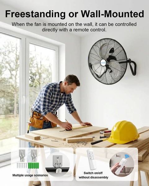 20 Inch Industrial Floor Fan With Remote Control wall mounted in a workshop, shown providing cooling while a man works