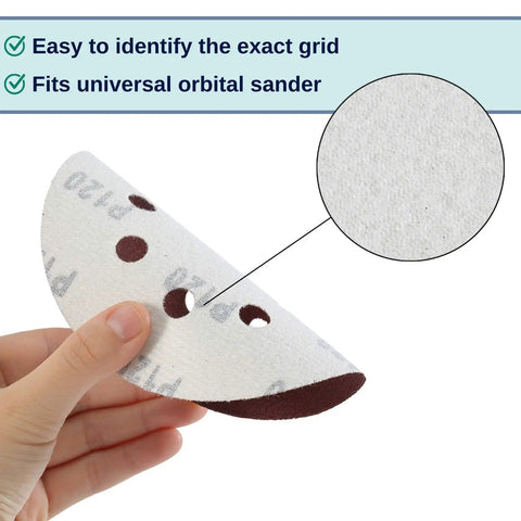 Hand holding one disc from Five Inch 8 Hole Sanding Discs Set, 30 Pack with Assorted Grits, showing fit for universal orbital sander.