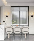 Lit Black Crystal Vanity Lights Set Of 2 Industrial Mid Century Wall Sconces in modern kitchen with dining table.