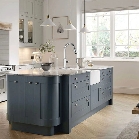 Chrome Pull-Down Kitchen Faucet With Two-Function Sprayer, Single Hole Mount, on modern kitchen island under pendant lights