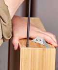 4 Pack Stainless Steel Angle Brackets Thickened Design Heavy Duty Triangle Corner Supports With Screws being installed on a wooden shelf