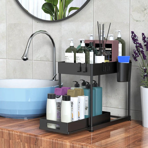 Under Sink Organizer No Brainer With Pull Out Drawer Two Tier Cabinet Storage displaying bathroom supplies on counter