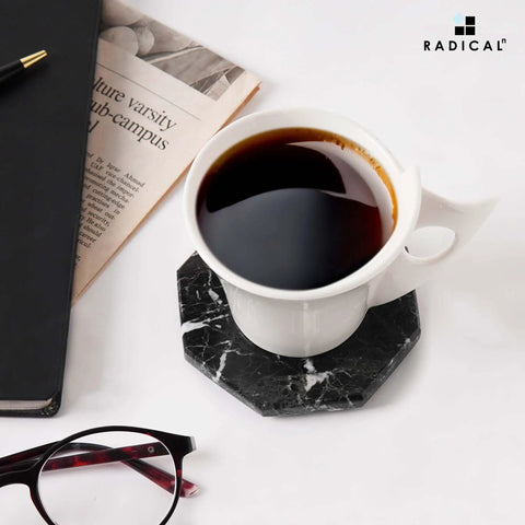 Slick Black Star Marble Coasters Set Of Six Natural Polished Stone Drink Guards For Coffee And Dining Tables with coffee mug.