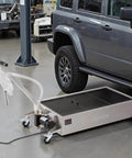 Heavy Duty Electric Oil Drain Pan With 20 Gal Capacity And 110V High Flow Pump, Rolling Waste Oil Tank next to a vehicle in a garage.