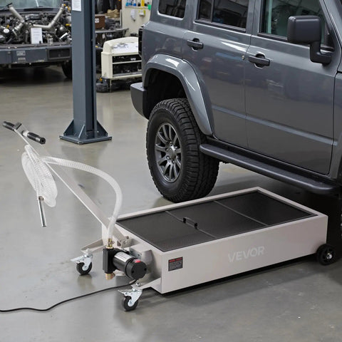 Heavy Duty Electric Oil Drain Pan With 20 Gal Capacity And 110V High Flow Pump, Rolling Waste Oil Tank next to a vehicle in a garage.