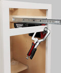 Ultimate Cabinet Jig Bundle For DIYers with Drawer Slide Jig installed in a wooden cabinet frame