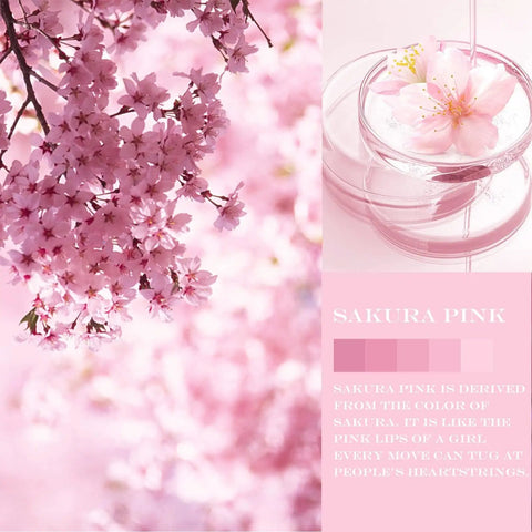 Sakura flowers in bloom next to a glass dish with a single sakura flower, showcasing various sakura pink shades.