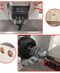 Close-up of Heavy-Duty Pneumatic Hinge Boring And Drilling Machine For Woodworking Vertical And Horizontal Drill Press with drill bit and wood holes visible.
