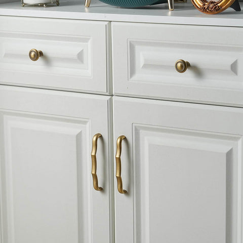 Solid Brass Cabinet Pulls 5 Pack, 5 Inch Hole Center Drawer Handles installed on white cabinets