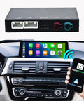 Wireless CarPlay Android Auto Retrofit Kit Decoder Box For BMW NBT System installed in car dashboard with smartphone integration