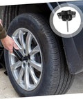 Person securing car tire with Chrome Spare Tire Fixing Bolt For Cars And SUVs Multimodel Fit Wheel Bolt Hook Replacement Lock