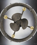 Slick Mid Century Modern Ceiling Fan With Brushed Silver Blades And Super Quiet Motor For Chill Living Room Atmosphere Featuring Handy Remote Control And Hassle Free Setup For Your Home - Close-up view of fan blades and light bulbs.
