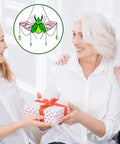 Stag Beetle Stained Glass Kit For Beginners With Pre Cut Pieces, Solder Wire, Flux Brush, and tools next to a smiling family.