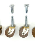 Medium One And Five Eighth Inch Hardwood Casters Pack Of 4 Replacement For Vintage Furniture Restoration For Hoosier Cabinets And Chairs Classic Antique Mobility Casters Move Pieces Smoothly While Preserving Original Character, showing 4 wood wheel casters with metal stems.