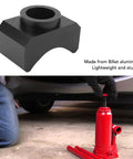 Beefy Billet Aluminum Axle Saddle Lifting Adapter for Hydraulic Jacks Universal Fit displayed with bottle jack