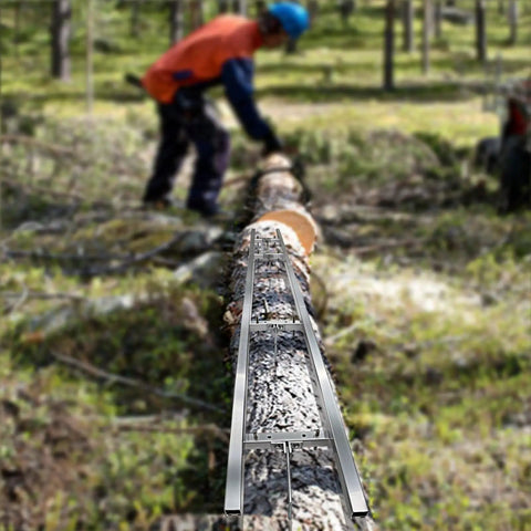 Nine Foot Chainsaw Mill With Aluminum Rail Guide System for Portable Log Milling in forest, log underneath rails