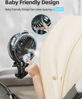 Baby pointing at Cooling Misting Stroller Fan With 6000mAh Battery, Portable Personal Fan With Light, on stroller handle