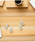 Set Of Six Premium Nylon Sliding Door Rollers With Cabinet Track Pulleys For Wardrobe Wheel Replacement Delivering No Sweat Setup Plus Hella Smooth Glide on wooden desk with stationary.